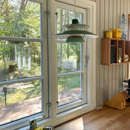 Black Wooden House Close To The Water * Hals